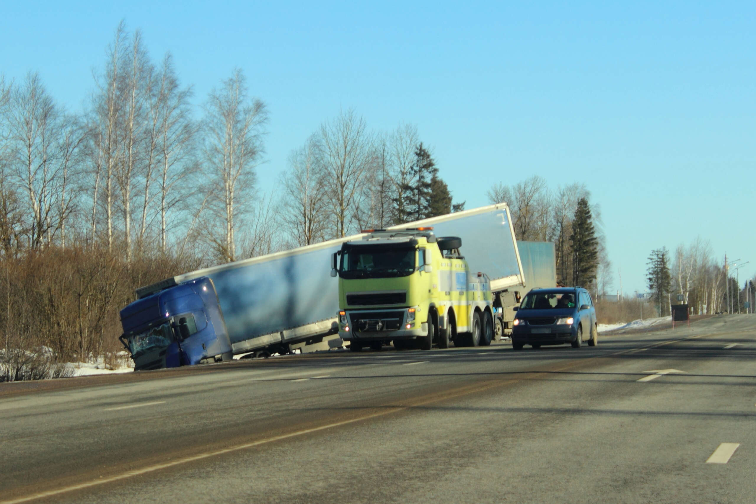 Overturned semi-truck accident highlighting liability in Edgewood commercial truck crashes